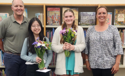 Seniors Jennifer Yu and Chloe Bentley were the recipients of the 2025 Parker and McCarthy Middle School scholarships. Pictured, left to right are Parker Middle School principal Josh Blagg, Yu, Bentley and McCarthy Middle School Assistant Principal Kerry Calobrisi.