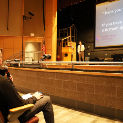 Serving as a judge during the Nov. 7 entrepreneurial competition at Chelmsford High School, Principal Stephen Murray asks a question of the Hall Pass Heroes group, which includes junior Chris Kurbs, freshman Theo Frias and sophomore Cameron Panzeri.