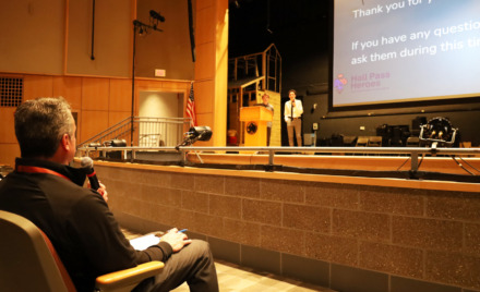 Serving as a judge during the Nov. 7 entrepreneurial competition at Chelmsford High School, Principal Stephen Murray asks a question of the Hall Pass Heroes group, which includes junior Chris Kurbs, freshman Theo Frias and sophomore Cameron Panzeri.