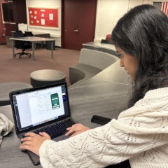 Chelmsford High School junior Reya Kannan shows how she has been coding her new app, Yard2Yum, which won her the Congressional App Challenge in Massachusetts's Third Congressional District.