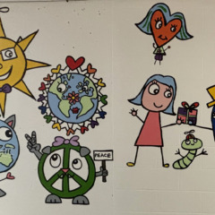A section of Bren Bataclan's completed mural in the hallway at Harrington Elementary School.