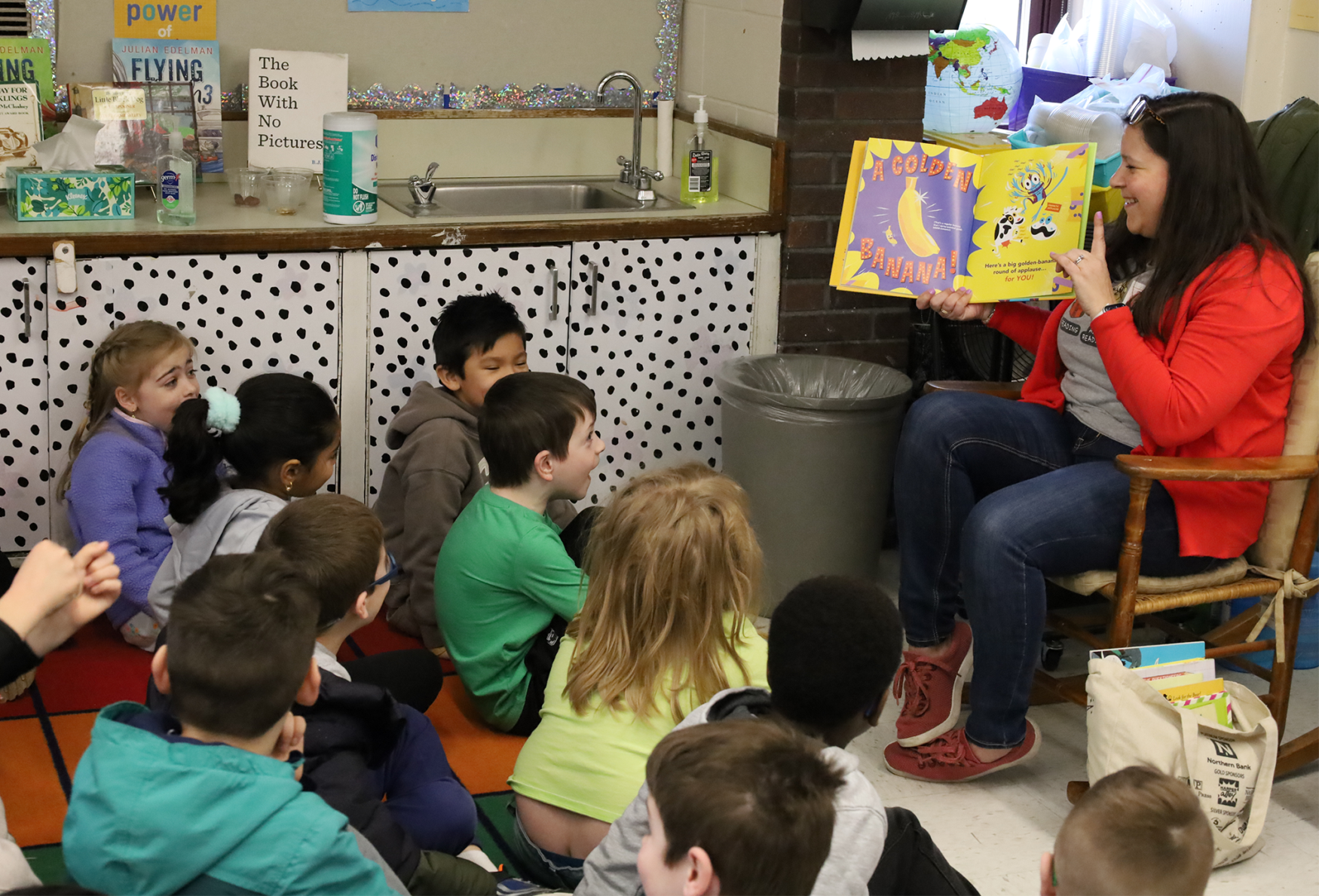 Byam School Association member Melissa McCaffrey reads “Crash, Splash, or Moo!” to Ms. DuDevoir’s second grade class at Byam Elementary School during the annual Chelmsford Community Read-In on Wednesday, March 4.