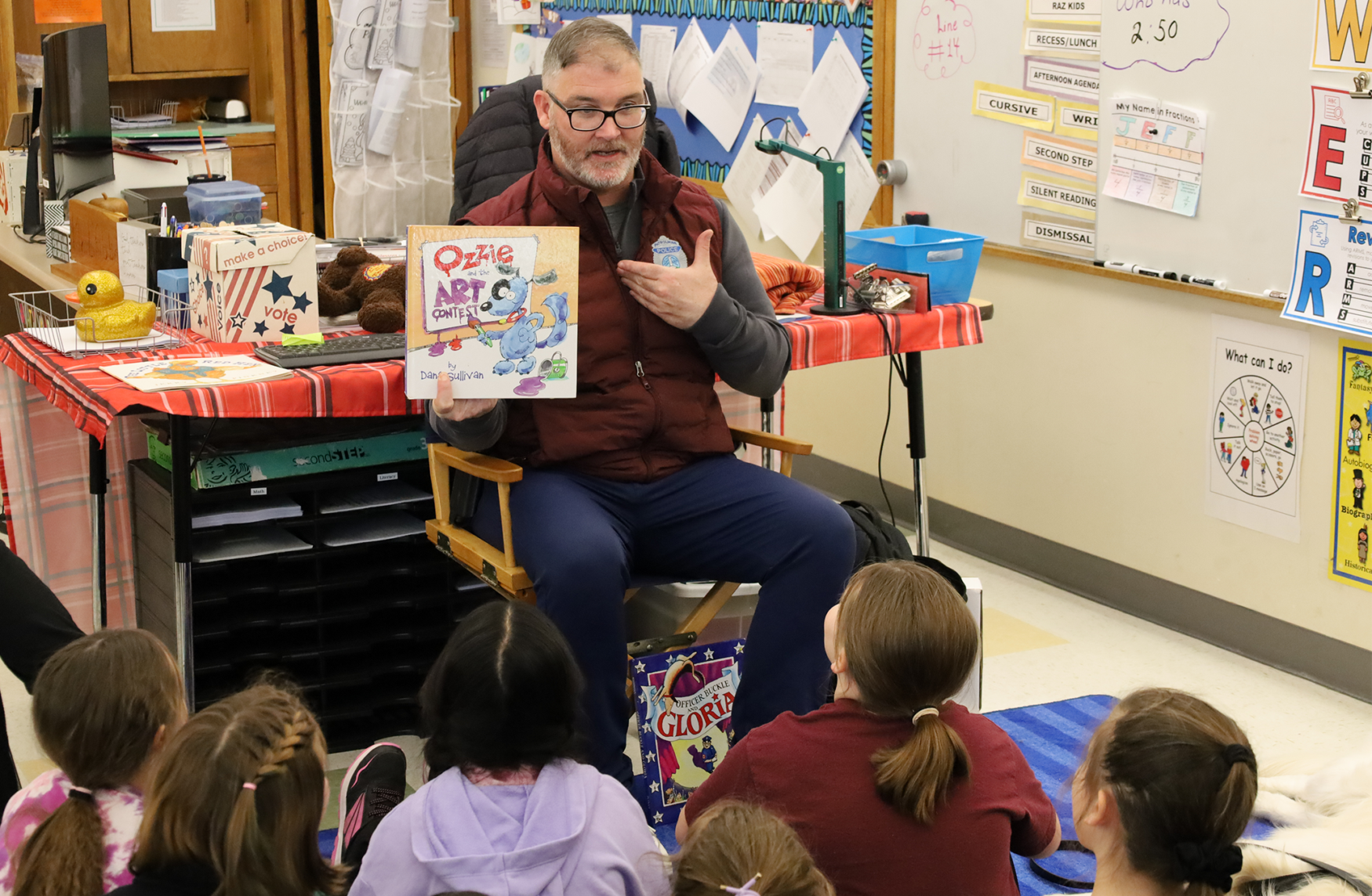 School Resource Officer Dan Sullivan reads “Ozzie and the Art Contest” to Mr. L’Abbe’s third grade class at Center Elementary School during the annual Chelmsford Community Read-In on Wednesday, March 4.