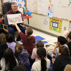 School Resource Officer Dan Sullivan reads “Officer Buckle & Gloria” to Mr. L’Abbe’s third grade class at Center Elementary School during the annual Chelmsford Community Read-In on Wednesday, March 4.