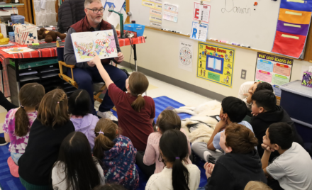 School Resource Officer Dan Sullivan reads “Officer Buckle & Gloria” to Mr. L’Abbe’s third grade class at Center Elementary School during the annual Chelmsford Community Read-In on Wednesday, March 4.