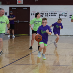 Action from the second annual Buddies vs. Badges charity basketball game on April 16, 2026.