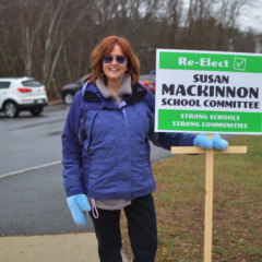 School Committee incumbent Susan Mackinnon stands outside the Chelmsford Senior Center polling station during the April 7, 2026, town election.