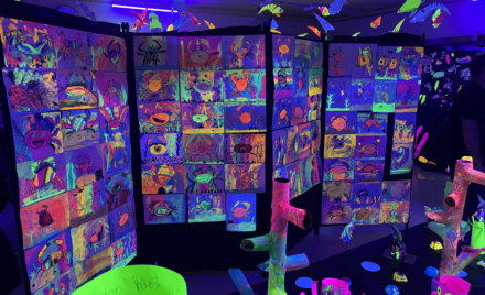 The aquatic-themed glow room at South Row Elementary School's Art Show on Thursday, May 14, 2026.