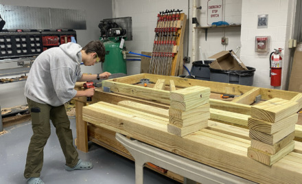 Students in Woodworking classes at Chelmsford High School work on their projects.