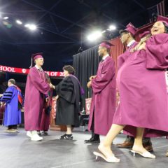 The graduates of Chelmsford High School's Class of 2026 make their way through the receiving line after receiving their diplomas on June 6, 2026.