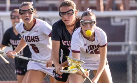 Chelmsford’s Marykate McDonald, front, and Wellesley’s Tara Battaglino battle for a loose ball during Chelmsford’s 7-6 girls lacrosse win on June 3, 2026.