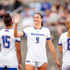 Chelmsford’s Eliana Parreira is all smiles as she’s introduced prior to a game against UMass at Cushing Field in Lowell. She’s one of the top defensive players in the America East Conference.