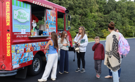 Families enjoy treats from an ice cream truck outside Byam Elementary School during the Back To School Social on Thursday, Sept. 24, 2026.