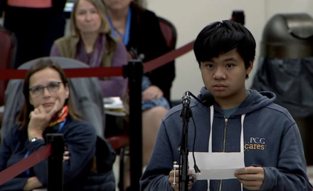 Chelmsford High School Ecology Club member Loi Duong speaks in favor of the proposed ban on single-use black plastic food containers at local food establishments. [Screen grab courtesy of Chelmsford Telemedia]