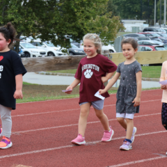Kindergarteners participate in the Harrington Elementary School Walk-A-Thon on Friday, Oct. 2, 2026.